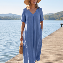Wrenley maxi in blue on a waterfront boardwalk