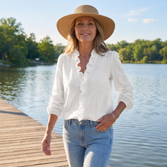 Isadora blouse worn on a lakeside boardwalk
