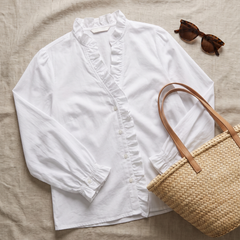 Isadora blouse flat-lay with accessories