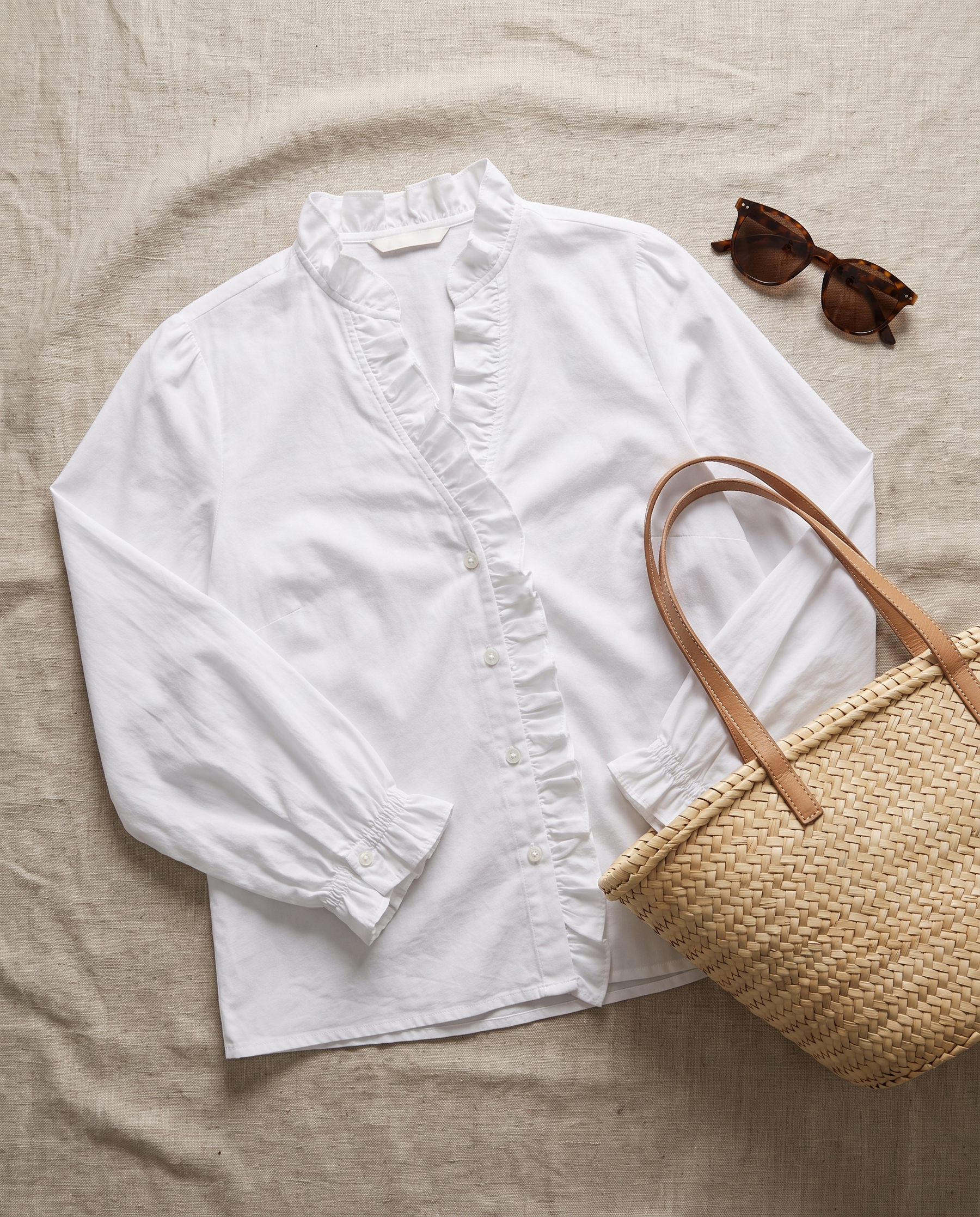 Isadora blouse flat-lay with accessories